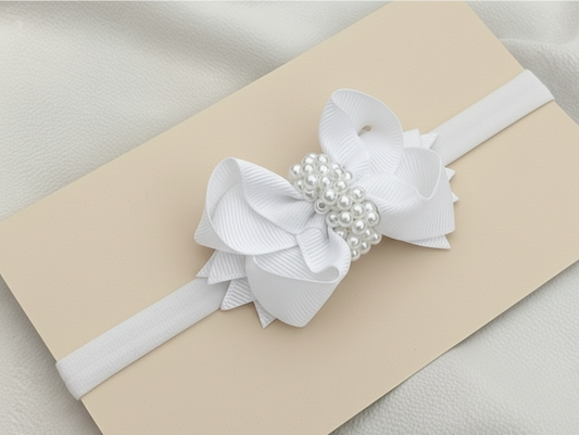 Cintillo lazo boutique decorado con perlas.cod001