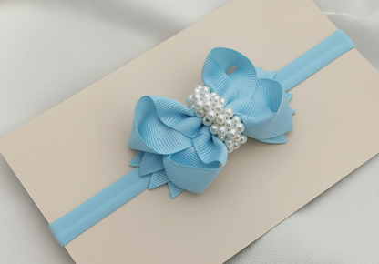 Cintillo lazo boutique decorado con perlas.cod001