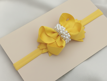 Cintillo lazo boutique decorado con perlas.cod001