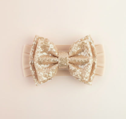 Cintillo doble lazo lentejuelas cod.44