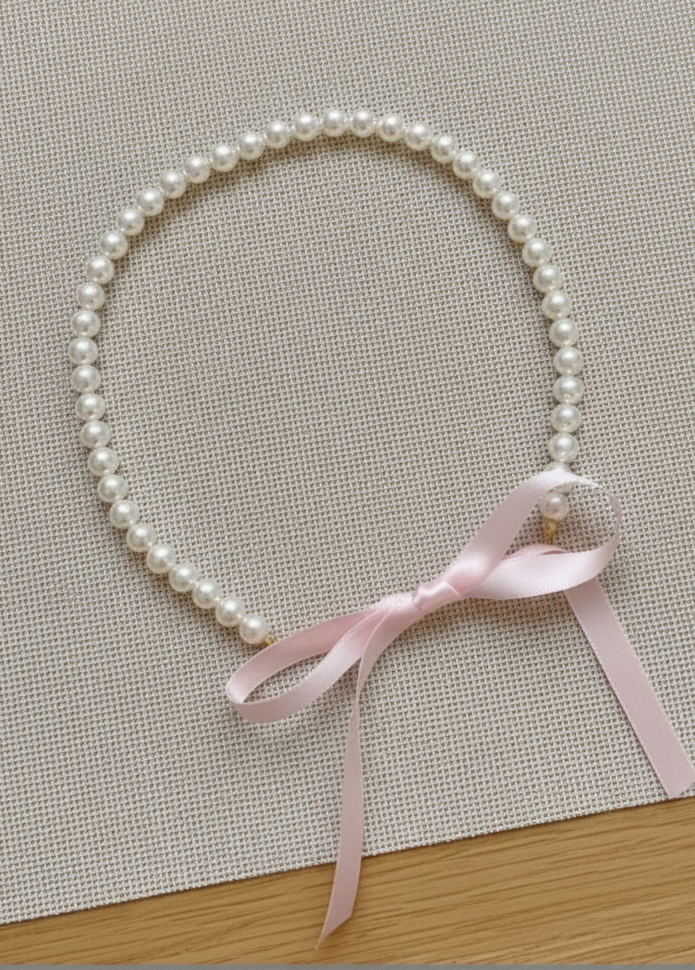 Collar de perlas, estilo coquette