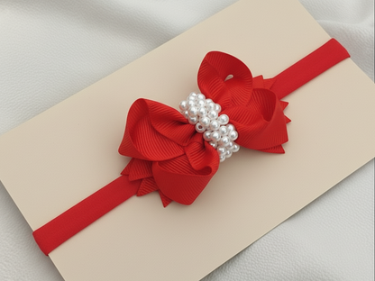 Cintillo lazo boutique decorado con perlas.cod001