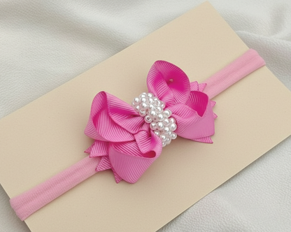 Cintillo lazo boutique decorado con perlas.cod001